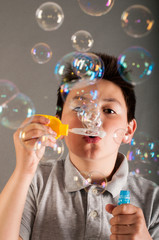 Boy and soap bubbles