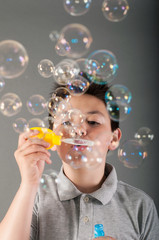 Boy and soap bubbles