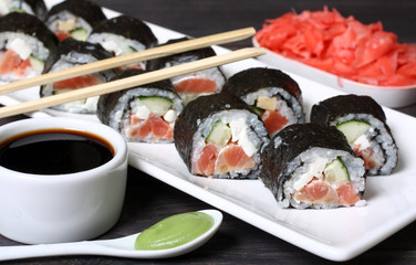 Japanese sushi rolls with salmon and tofu