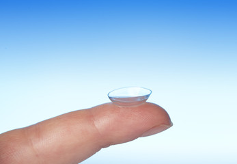 contact lens on finger