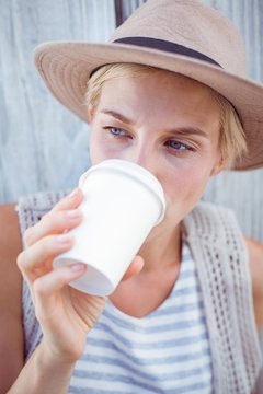 Pretty blonde woman drinking coffee