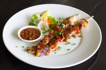 Grilling shashlik on barbecue grill. Selective focus