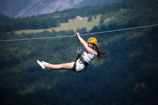 Adult woman on zip line