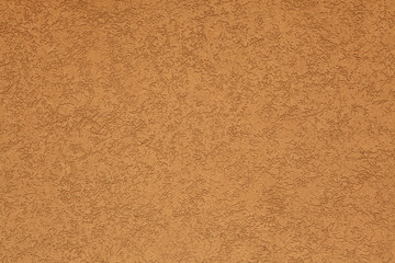 Fototapeta premium Terracotta stucco wall. Background texture.