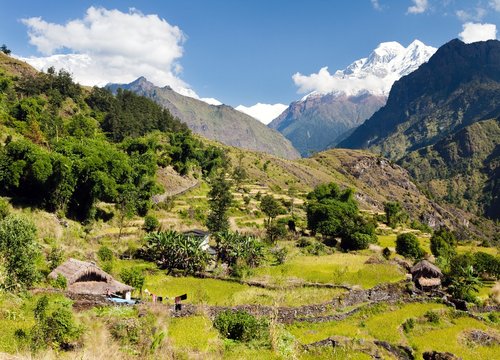 Beautiful village in western Nepal with mount Dhaulagiri
