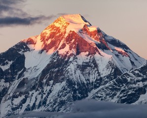 mount Dhaulagiri with sunshine colored mountain top