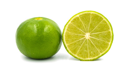 Limes with slices  on white background