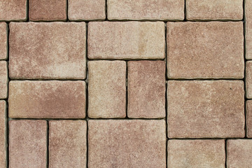 Detail of a concrete pavement with tiles