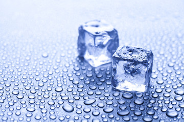 ice cubes on blue background