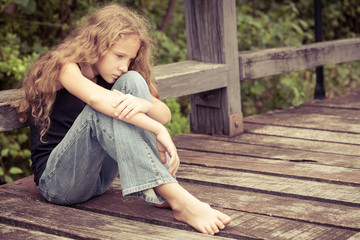 Portrait of sad blond teen girl