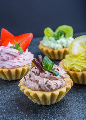 Small biscuits with fruits and sweet cream