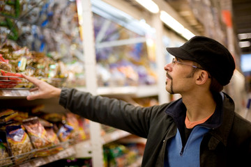 Man checking food labelling