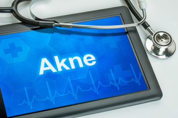 Tablet mit dem Text Akne auf dem Display