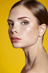 Portrait of beautiful young woman with clean face.