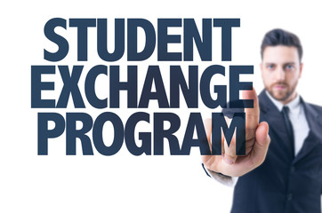 Business man pointing the text: Student Exchange Program