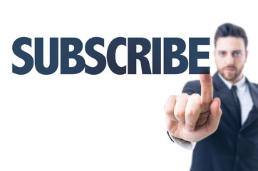 Business man pointing the text: Subscribe