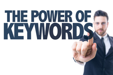 Business man pointing the text: The Power of Keywords