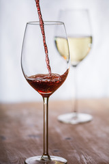 Wine gets filled into a glass