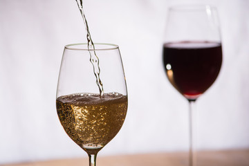 Wine gets filled into a glass