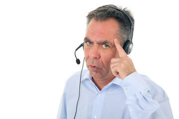 Genervter Mann mit Headset