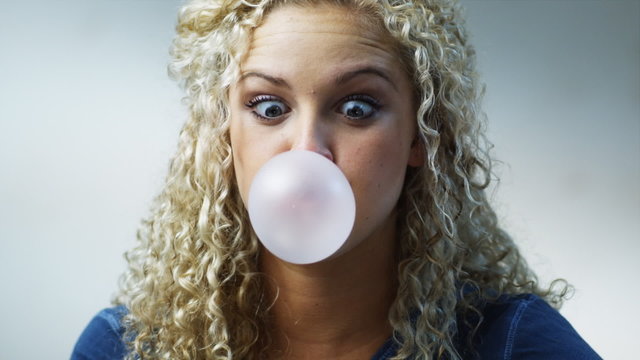 Woman Chewing Bubble Gum