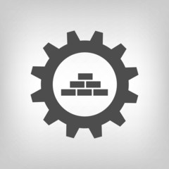 Obraz premium Grey construction logo wih gear wheel and bricks