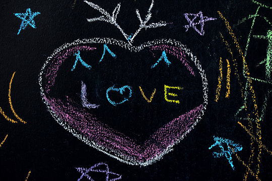The word love written on a blackboard