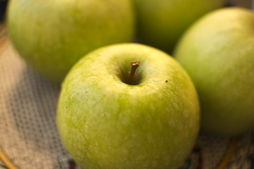 Fresh green apples in natural light