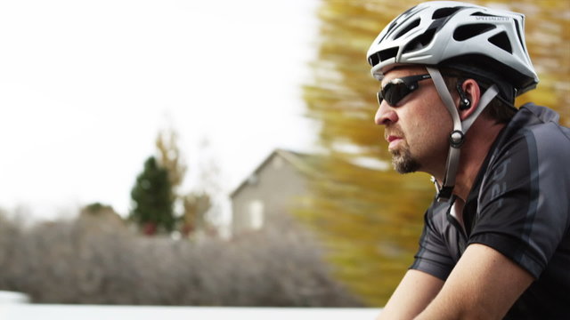 MS TS Man cycling in countryside / Highland, Utah, USA