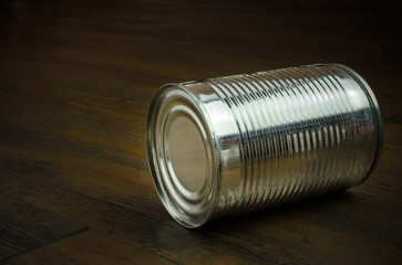 Aluminum cans on wooden background