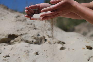 песок в руках