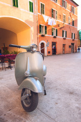 Italian popular mode of transport scooter parked in the Tuscan t