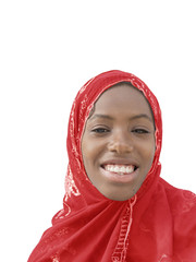 Young Afro beauty wearing a red headscarf, isolated