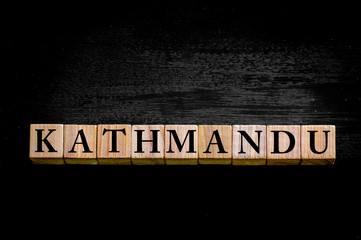 Word KATHMANDU isolated on black background