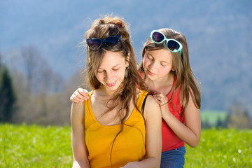 Mom and daughter reading a book