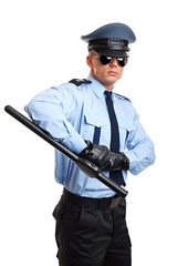 Policeman in sunglasses holds nightstick on white background