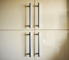 Kitchen cabinet, steel handles