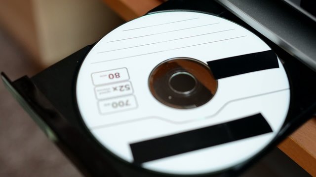 DVD disk - optical drive - insertion DVD to the optical drive