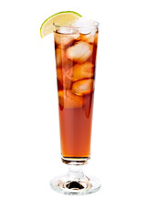 Cocktail with cola ice cubes  in a tall glass garnished slice of
