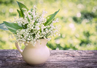 Photo sur Plexiglas Muguet Beautifyl bouquet of lilies of the valley on the table