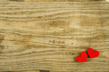 Hearts on empty wooden table