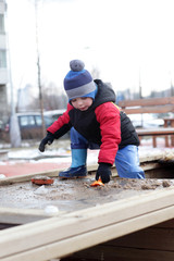 Kid playing in the sandbox