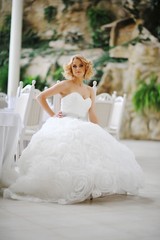 Young beautiful blonde model bride