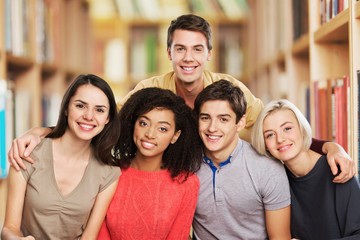 Academic. Group of african american college students in library