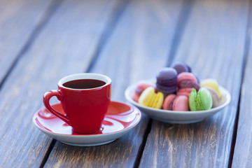 Cup of coffee and macarons