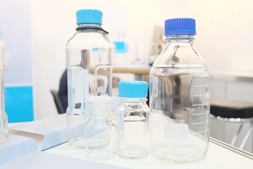 Laboratory equipment. Bottles of chemicals in the laboratory