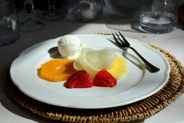 The plate of fruit in a restaurant