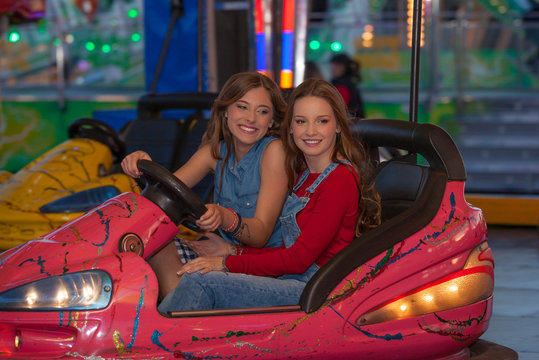 Kids At Fair Ground Riding Bumper Cars