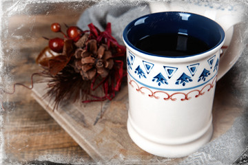 Cup of tea with book on table close-up
