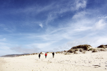 people walking on the beach in  Coast of death , Razo , Galicia,